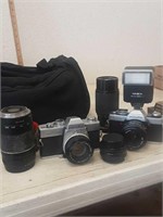 2 minolta cameras lenses and bag