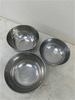Three metal mixing bowls