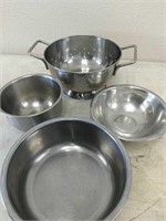 Metal colander and bowls
