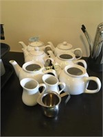 6 Tea Pots, Milk Pourers, Etc.
