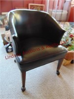 Black leather chair w/ wheels