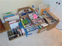 Large group of various types of books, vhs tapes,