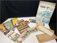 Antique travel brochures, postcards, notes, hotel
