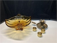Amber footed bowl, brass candle holder, napkin