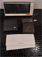 Brown wallet, two black wallets, And Sephora