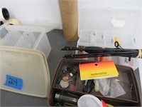 Assorted fishing items, fish nets, pole holders