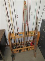 Assortment of fishing poles, 1 lg. lure, stand