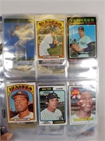 Various baseball cards in binder