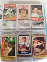 Various Baseball cards in a binder