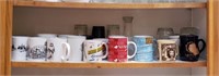 2nd Shelf from bottom: Mugs (kitchen)