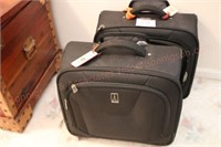 Two suitcases on wheels