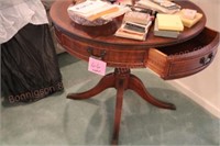 Round wooden table with two drawers, drop leaf