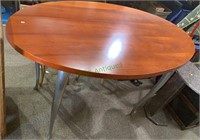 Tall oval table with cast aluminum legs, table