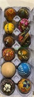 A dozen hand-painted wooden Russian eggs with