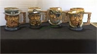 Maritime mugs, four hand-painted mugs depicting