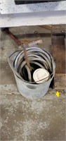 Metal bucket with hose