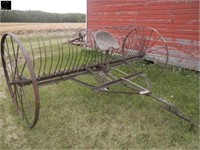 antique horse drawn dump rake converted to