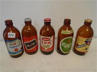 5 assorted Stubby Beer Bottles