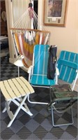 Misc chairs, outdoor chair, outdoor tables, lamp.