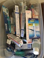 Large tub of dental supplies