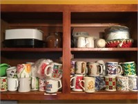 Contents of cabinet mugs salt and pepper shakers