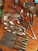 Miscellaneous silverware and serving pieces some