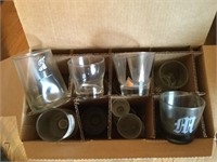 Box full of miscellaneous cocktail glasses