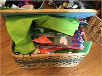 Large basket with lid with various gift bags and