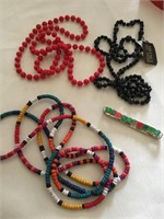 Three long beaded necklaces