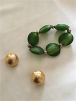 Gold and color clip on earrings and green