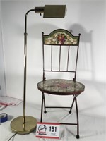 Brass lamp; iron chair