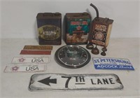 Oil cans, Chevelle clock, street sign, and others