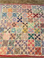 Hand quilted modified 9 block patchwork quimt