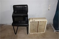 Pile: Chair, Microwave and Fan