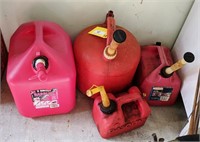 Four Plastic Gas Cans