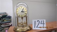 Battery operated glass domed anniversary clock