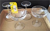 Four Champagne Glasses w/Silver Rims
