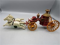 Vintage cast iron horse drawn fire wagon