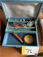 Blue jewelry box with contents