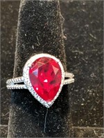 925 Sterling ring with red stone
Size 7