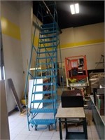Approximately a 16-foot rolling Warehouse ladder