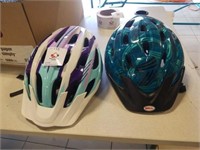 Two bicycle helmets