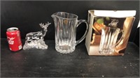 Crystal pitcher in the box and a crystal deer