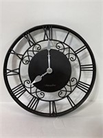 Mid-century repo metropolitan metal clock