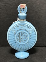Small blue porcelain 1974 C&J Bourbon bottle