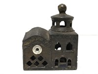 Small antique cast metal building