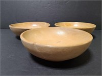 Three vintage wood bowls