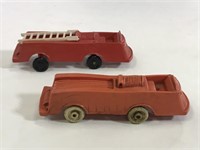 Two old plastic fire engine truck toys
