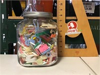 Coffee jar filled with toys
