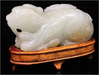 CHINESE CARVED JADE LION W/STAND, 19TH C.